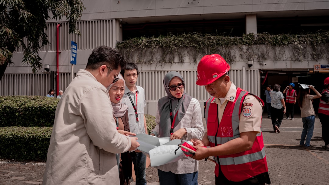 workplace safety inspector hard hat office - Photo by Fiqih Alfarish on Unsplash